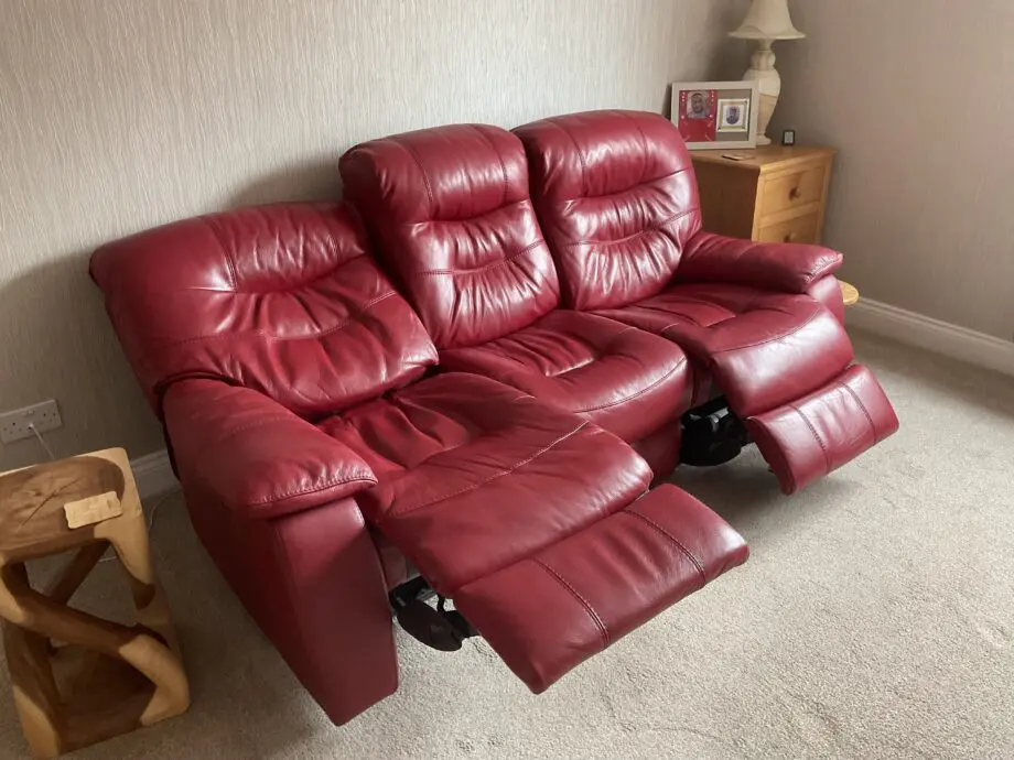Red leather three seat power recliner