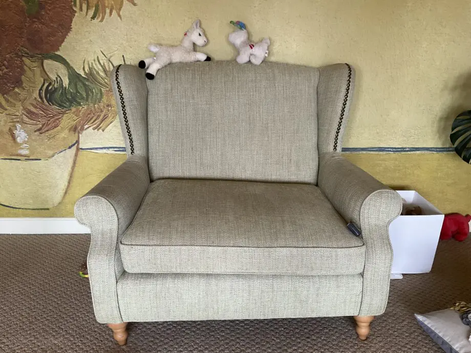 Light green fabric love seat