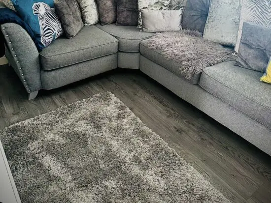 Grey sparkly thread corner sofa with accent chair and footstool