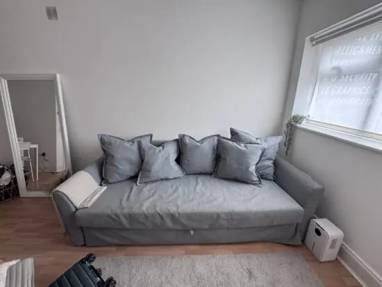 Ikea grey sofa bed with storage