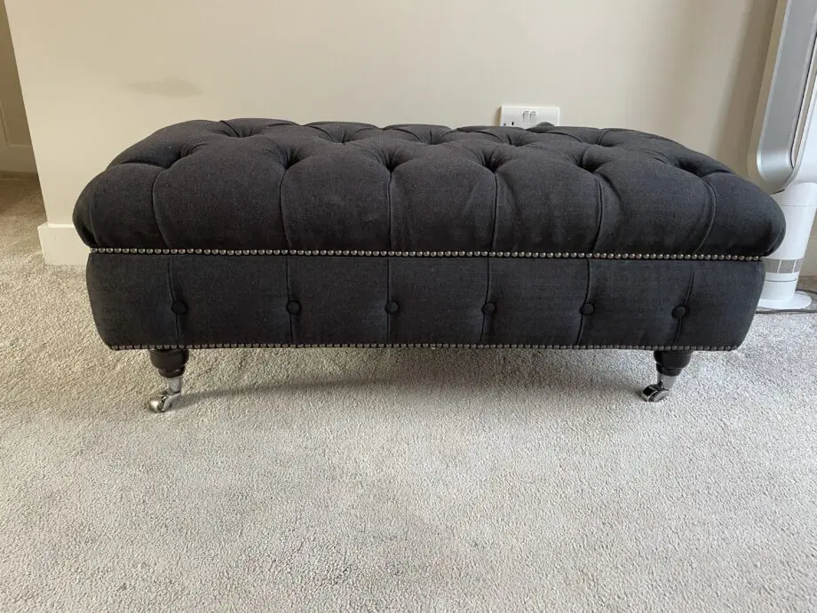 Dark grey two seater, snug chair and footstool