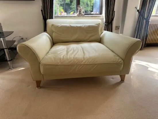 Cream leather loveseat. Jasper Conran, very good condition.