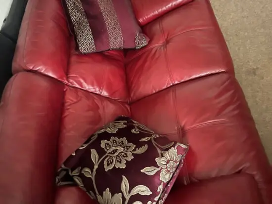 Red dfs leather sofa