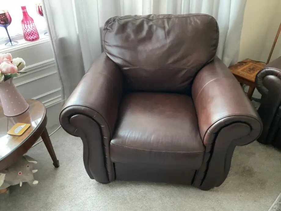 Dark brown leather armchair