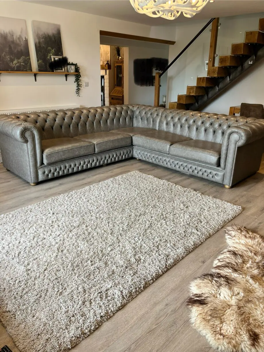 Grey Leather studded corner chesterfield
