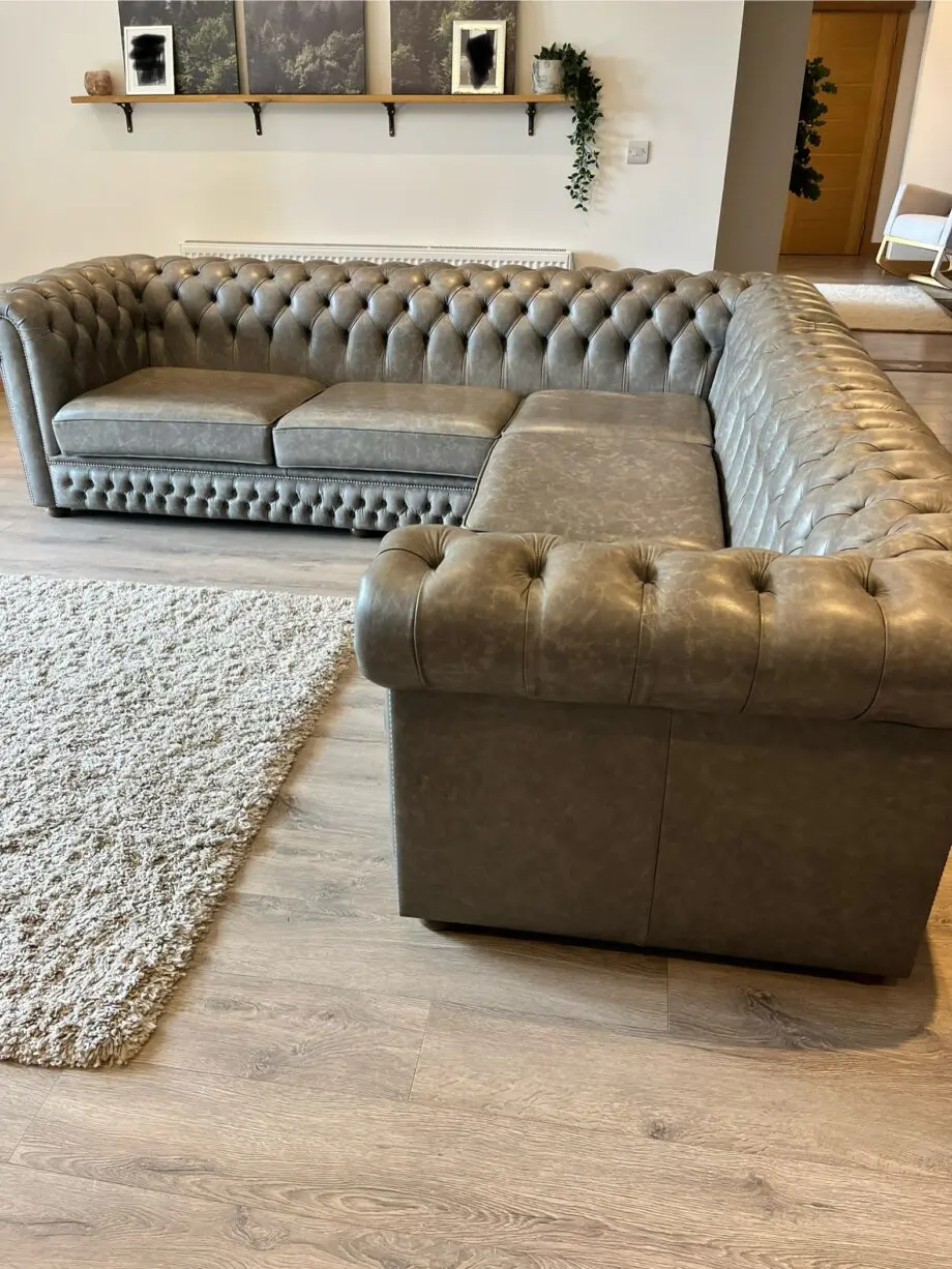 Grey Leather studded corner chesterfield