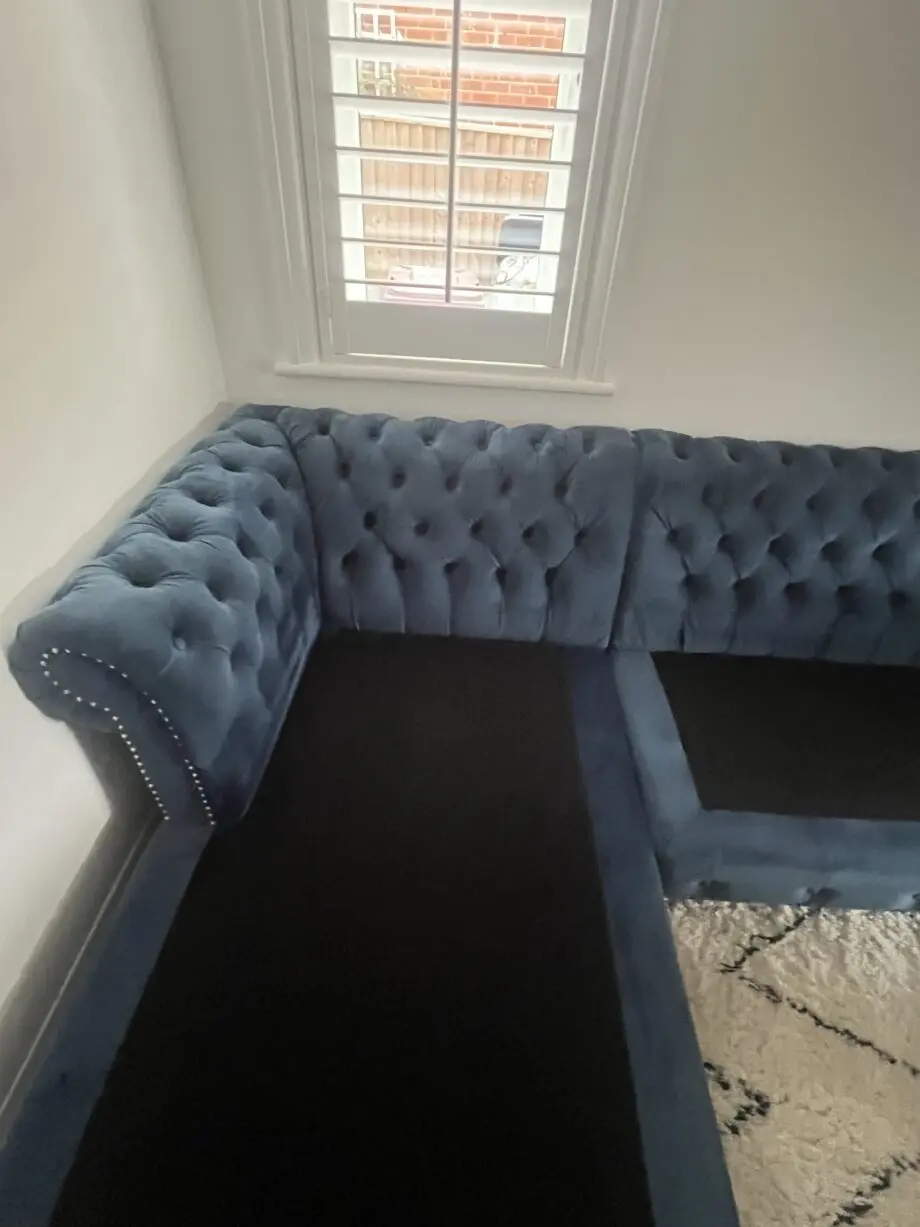 Oak furniture land Chesterfield navy chaise corner sofa with matching footstool and cushions