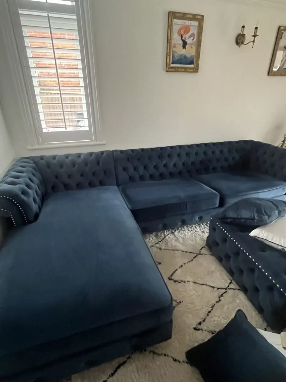 Oak furniture land Chesterfield navy chaise corner sofa with matching footstool and cushions