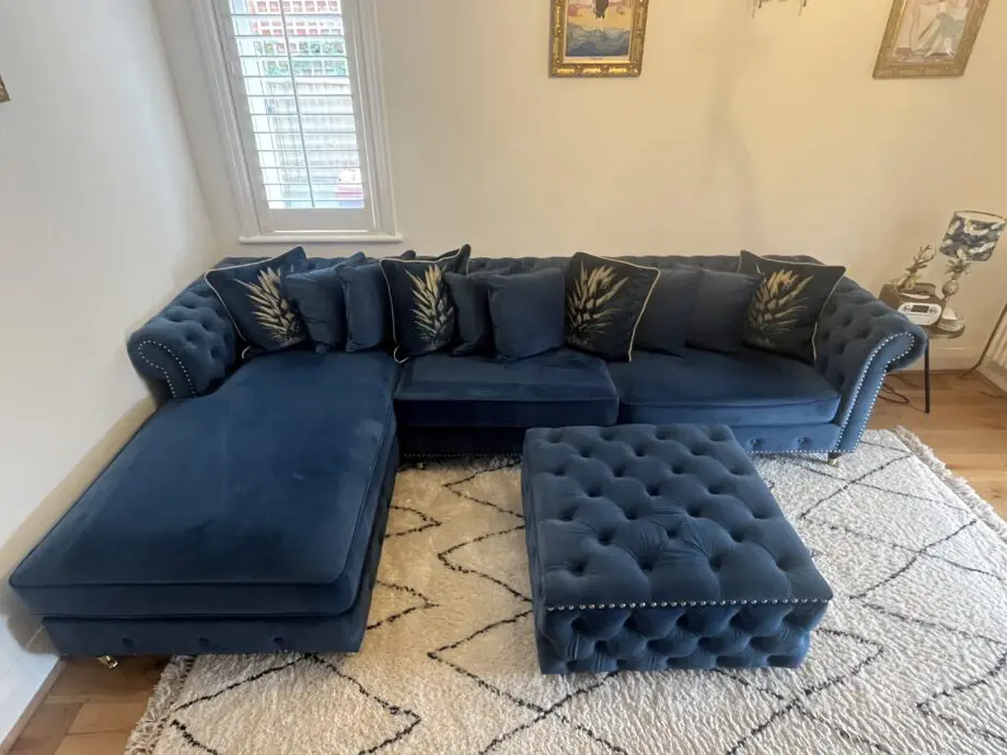 Oak furniture land Chesterfield navy chaise corner sofa with matching footstool and cushions