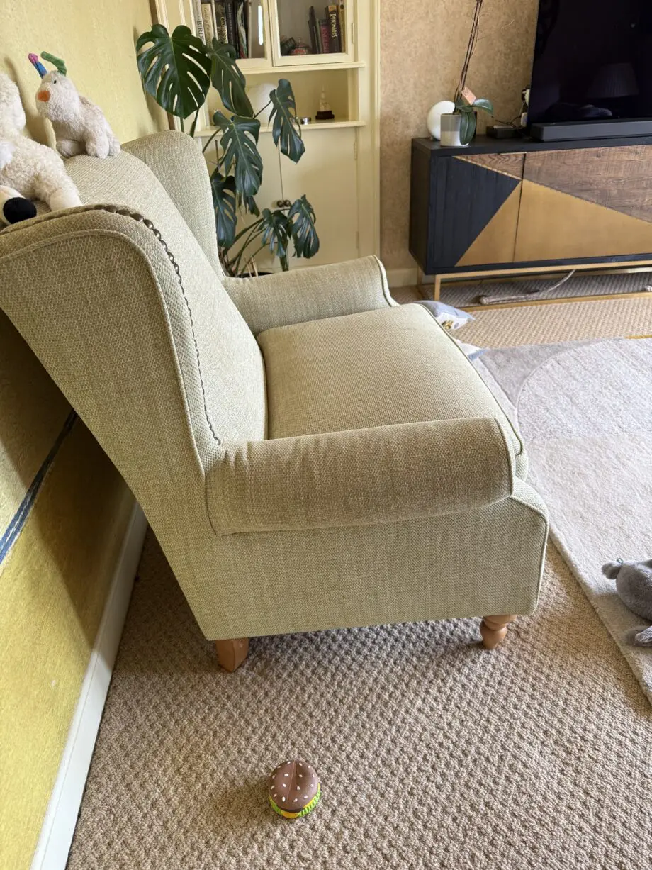 Light green fabric love seat