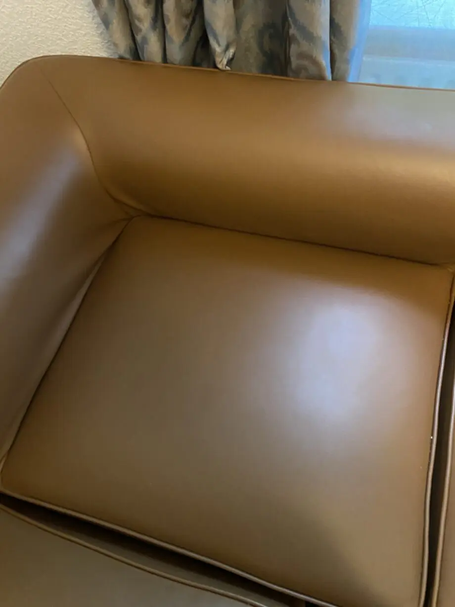 4-seater L-shaped brwon leather couch