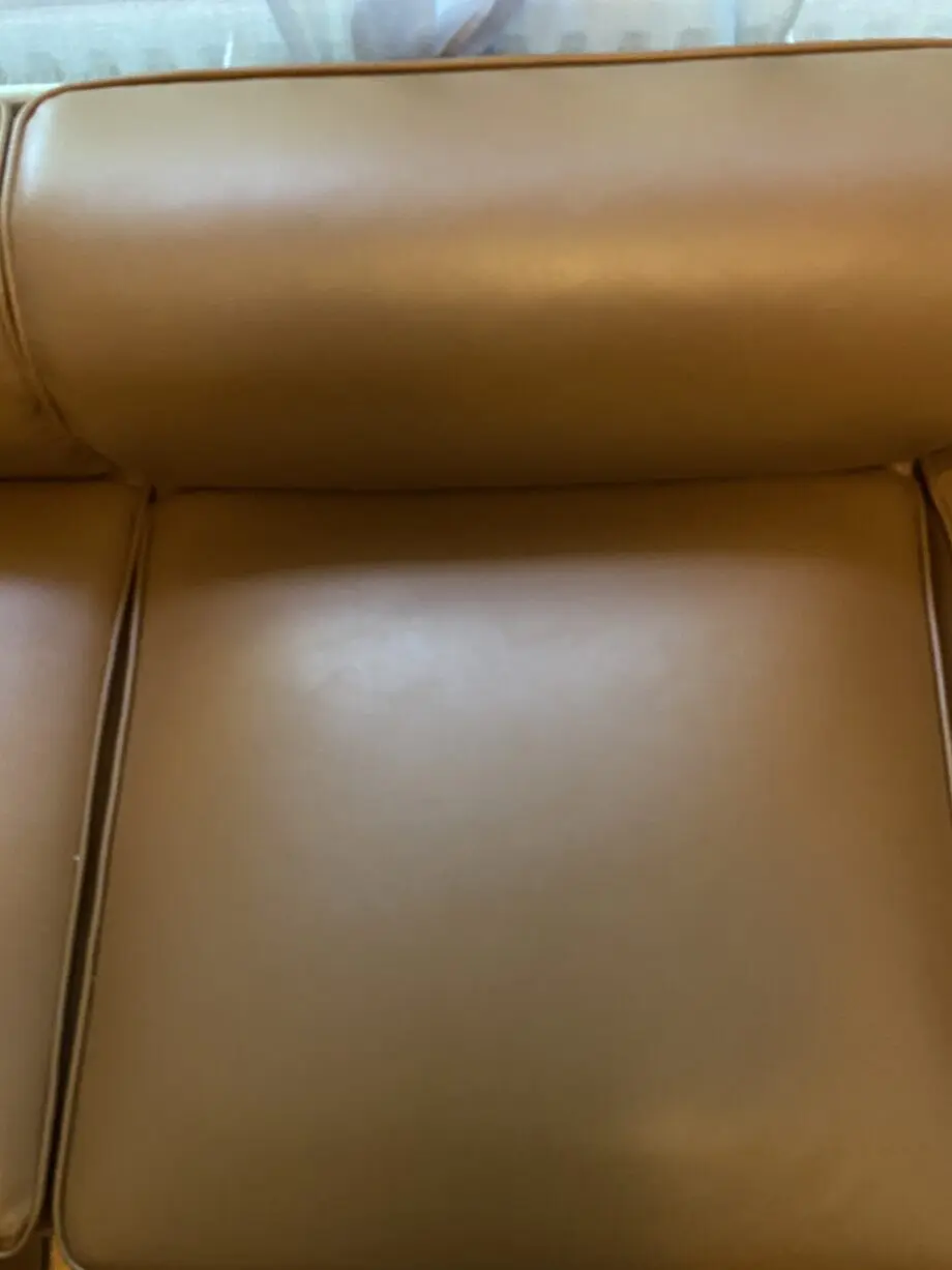 4-seater L-shaped brwon leather couch