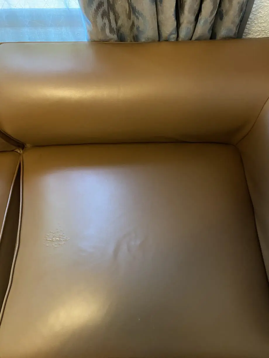 4-seater L-shaped brwon leather couch