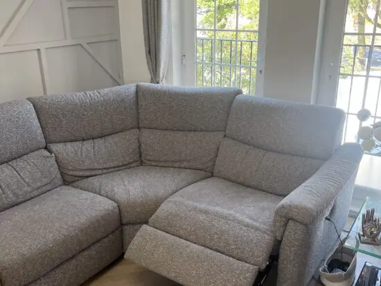 Natuzzi Grey cloth corner sofa