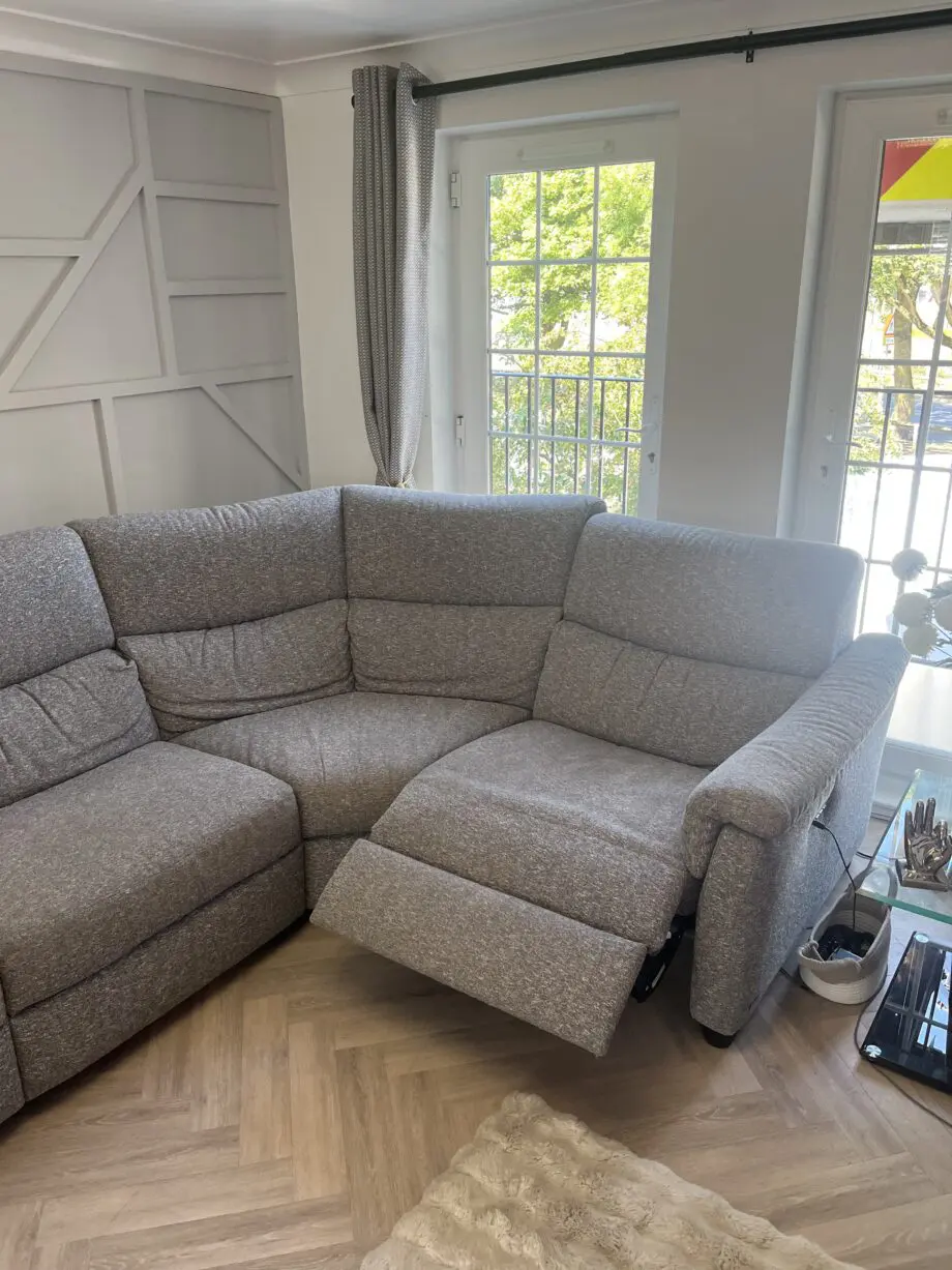 Natuzzi Grey cloth corner sofa