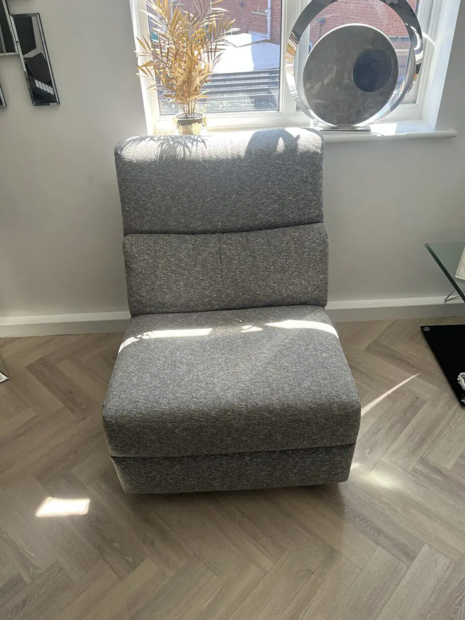 Natuzzi Grey cloth corner sofa