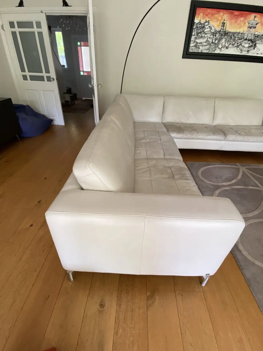 Natuzzi corner sofa with arms at either end