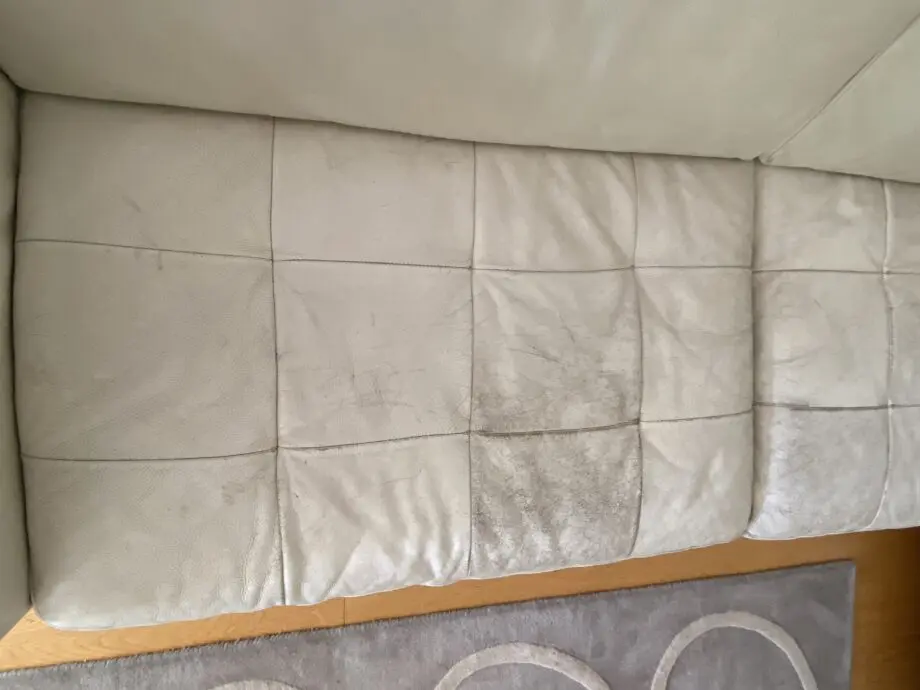 Natuzzi corner sofa with arms at either end