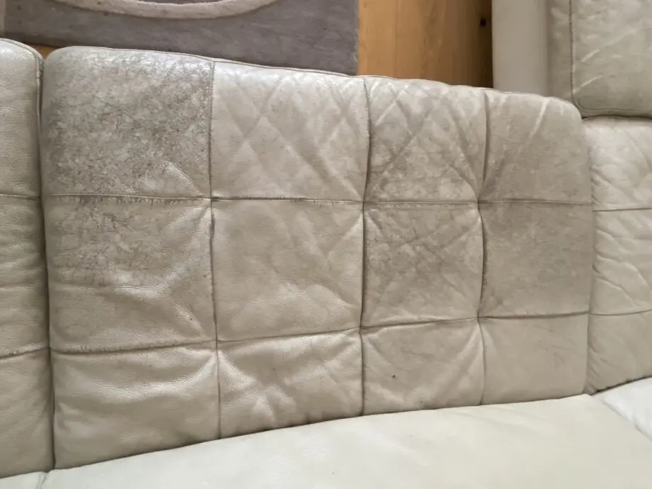 Natuzzi corner sofa with arms at either end