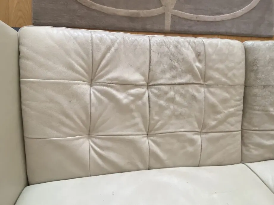 Natuzzi corner sofa with arms at either end