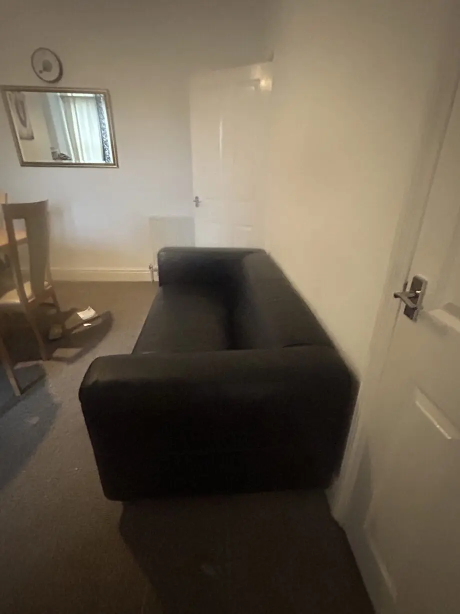 Black leather Sofa