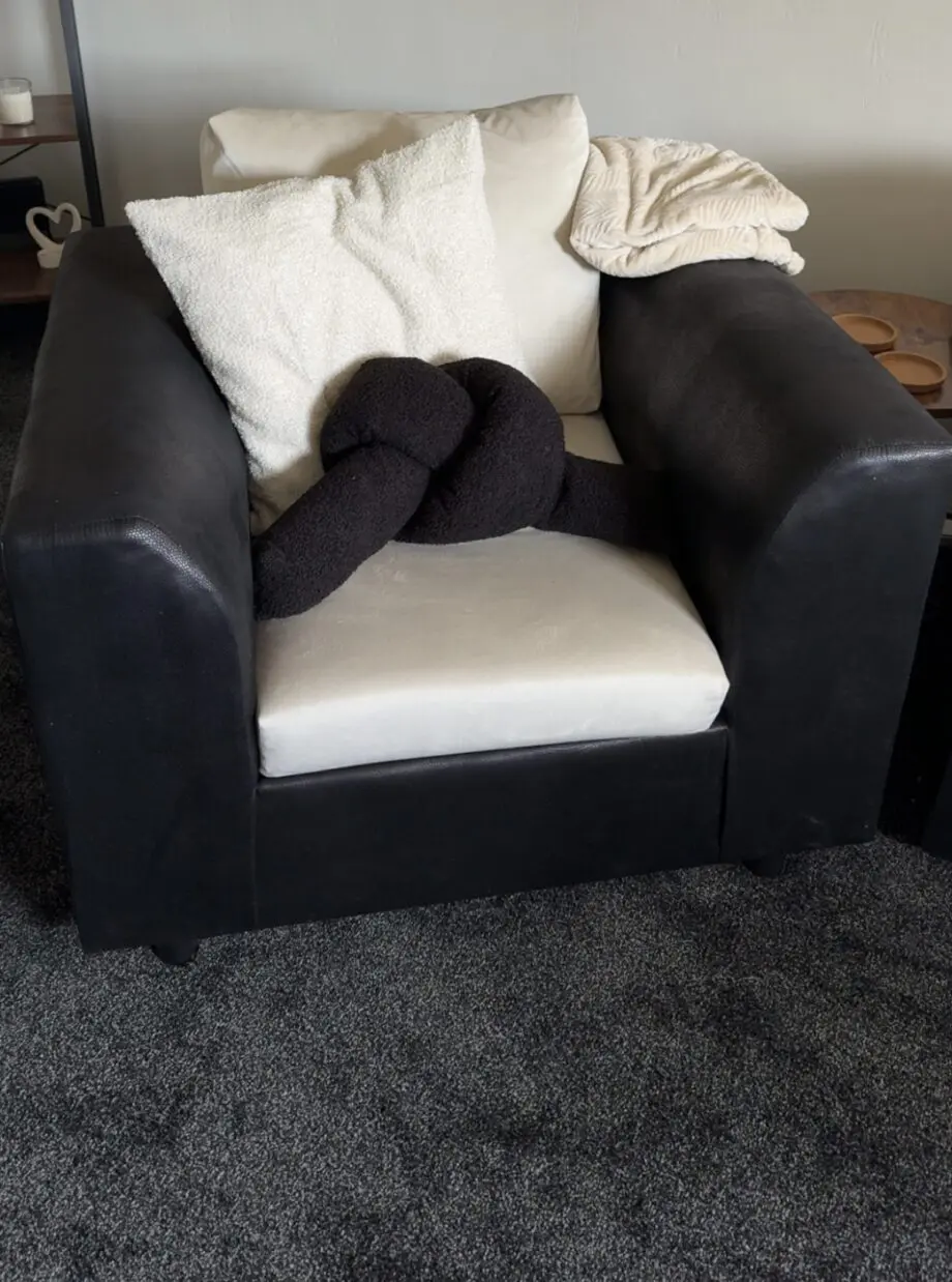Black and white suede sofa and chair.