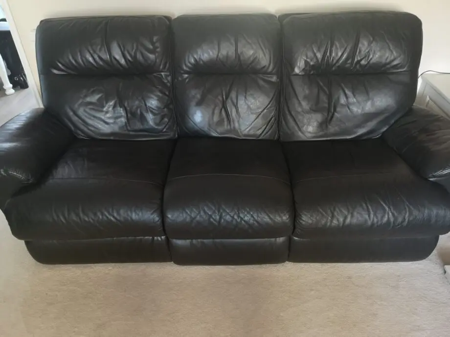 Black leather, reclining sofa