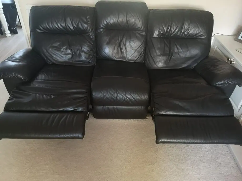 Black leather, reclining sofa