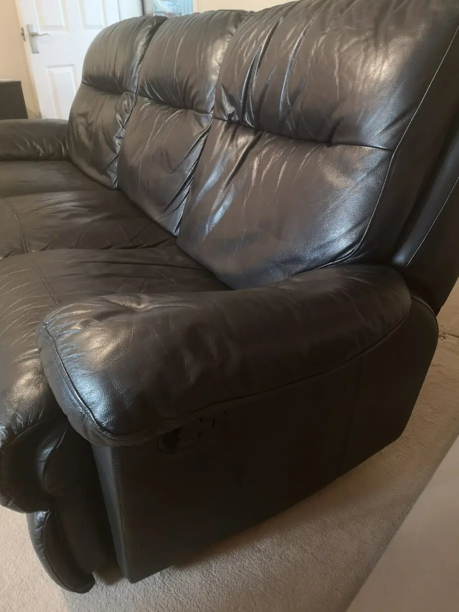 Black leather, reclining sofa