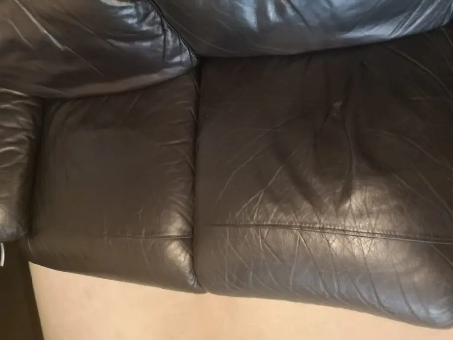 Black leather, reclining sofa