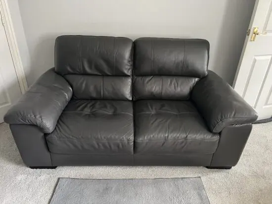 Charcoal gray leather 2seater sofa’s x2