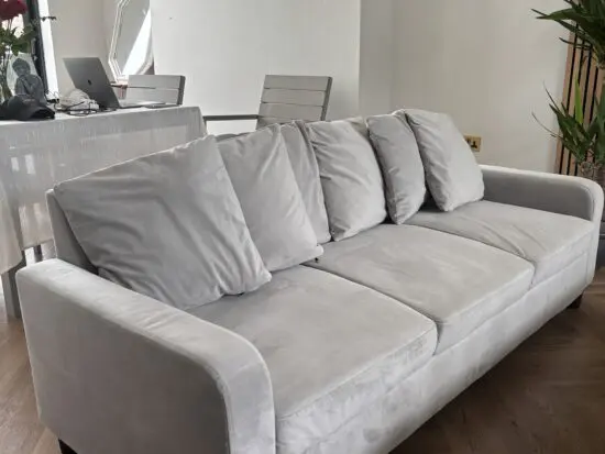Velvet grey sofa Laura James