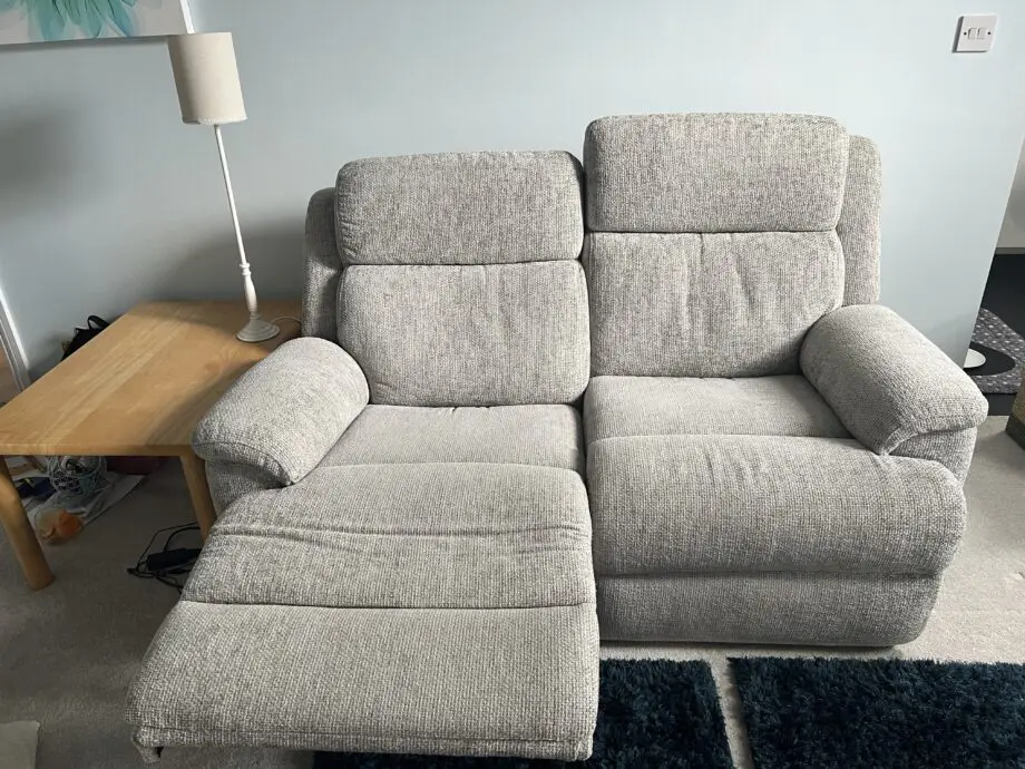 Silver-grey electric two seater Sofology sofa.