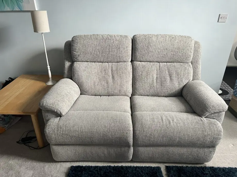 Silver-grey electric two seater Sofology sofa.
