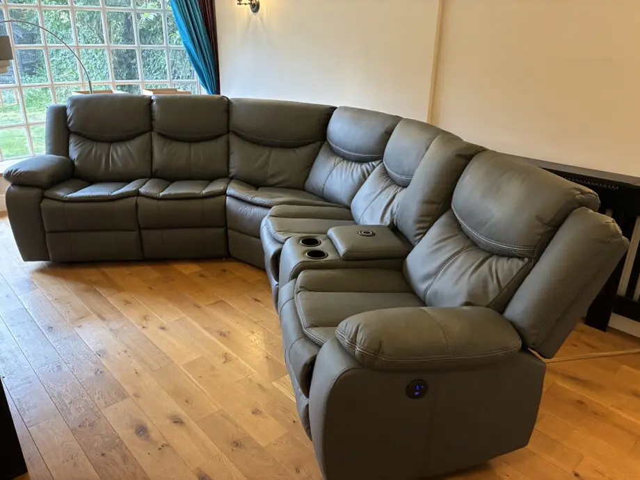 Sofashop Electric reclining leather corner sofa with chargers & cup holders