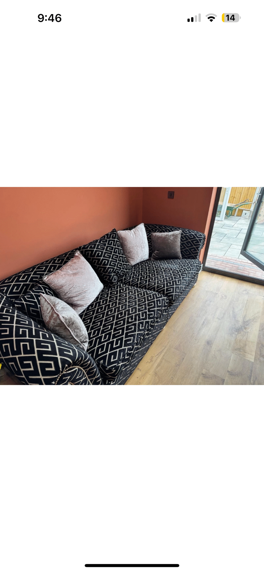 Patterned black large sofa
