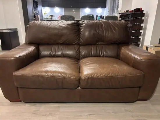 Furniture Village dark brown leather 2 seater sofa