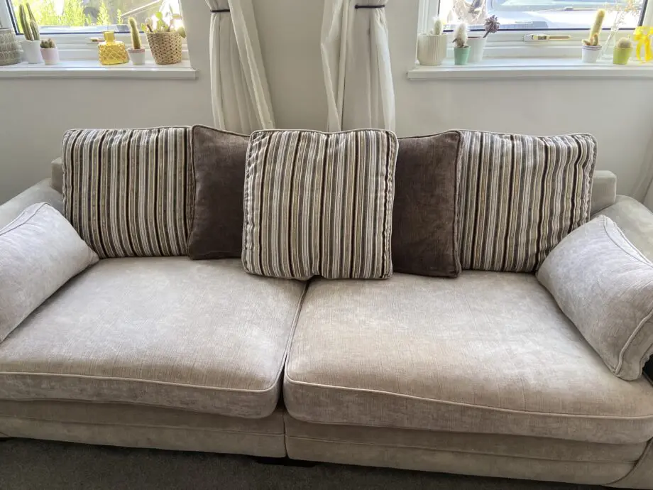 Three seater sofa, cuddle chair and footstool