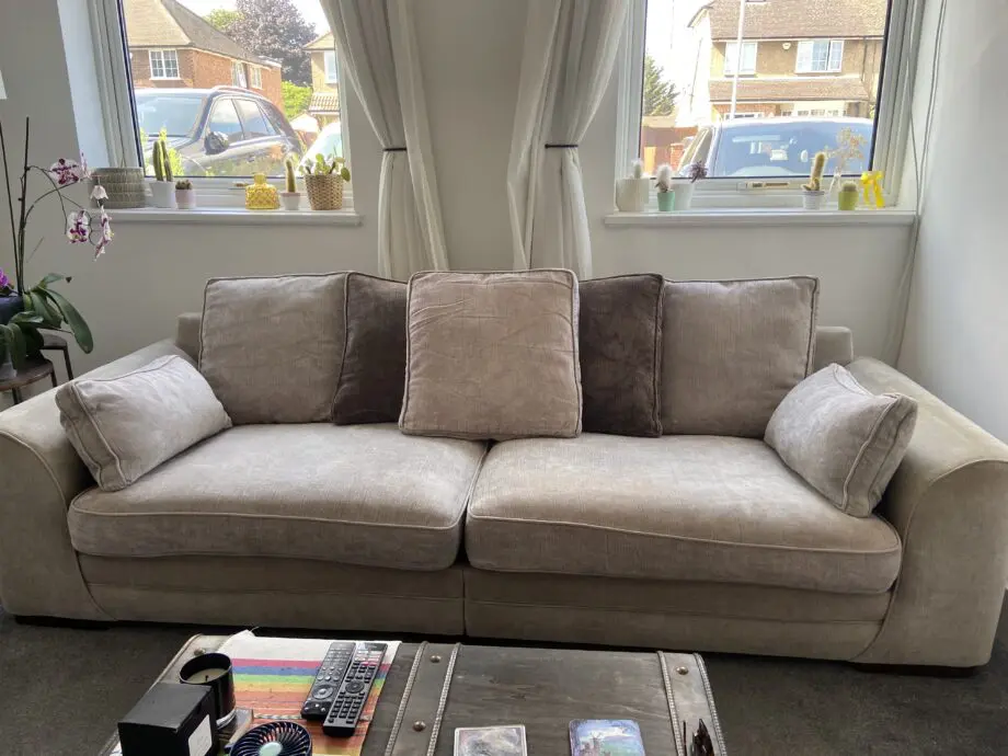 Three seater sofa, cuddle chair and footstool