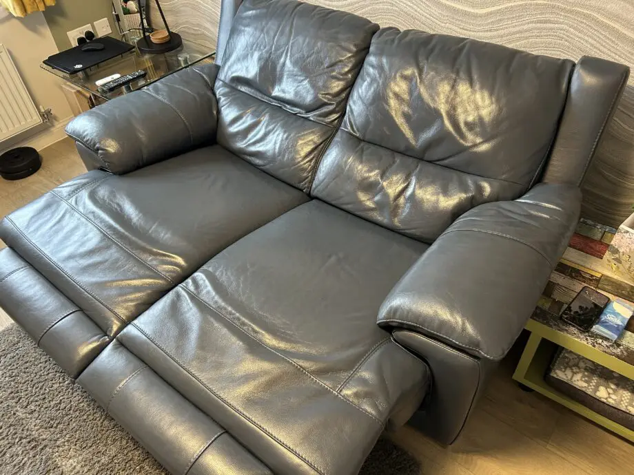 Dfs Falcon 2 seater power recliner sofa leather denim blue coloured