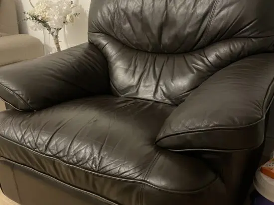 Brown leather armchair with recliner