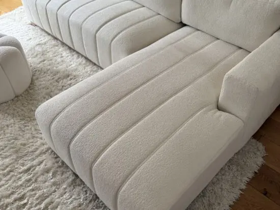 Belsize beige boucle sofa with wooden base, large chaise right hand facing