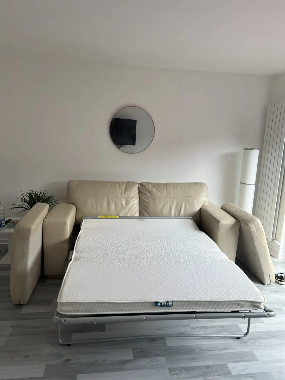 DFS beige 3 seater sofa bed