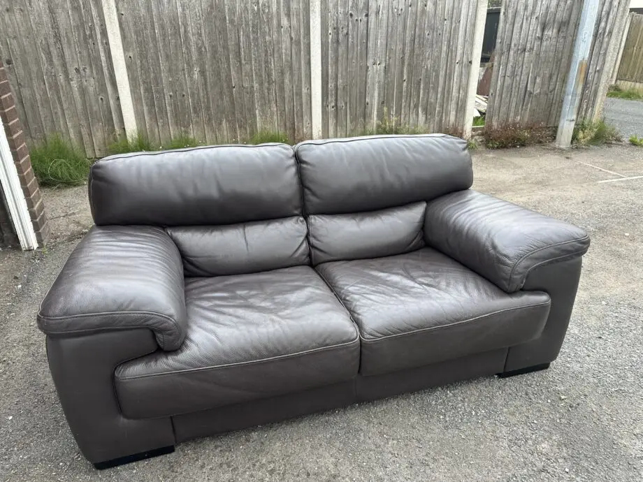 Chocolate brown two seat leather sofa