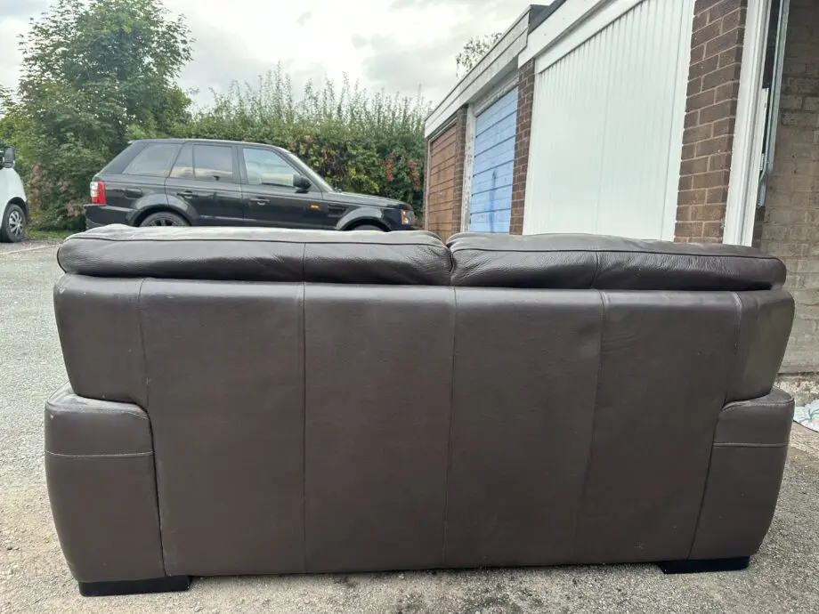Chocolate brown two seat leather sofa