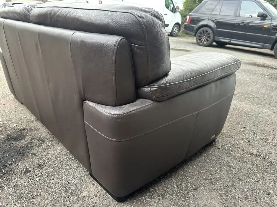Chocolate brown two seat leather sofa