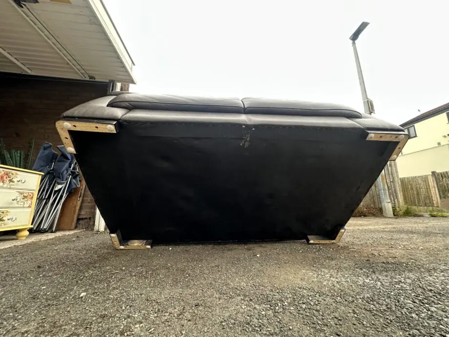 Chocolate brown two seat leather sofa