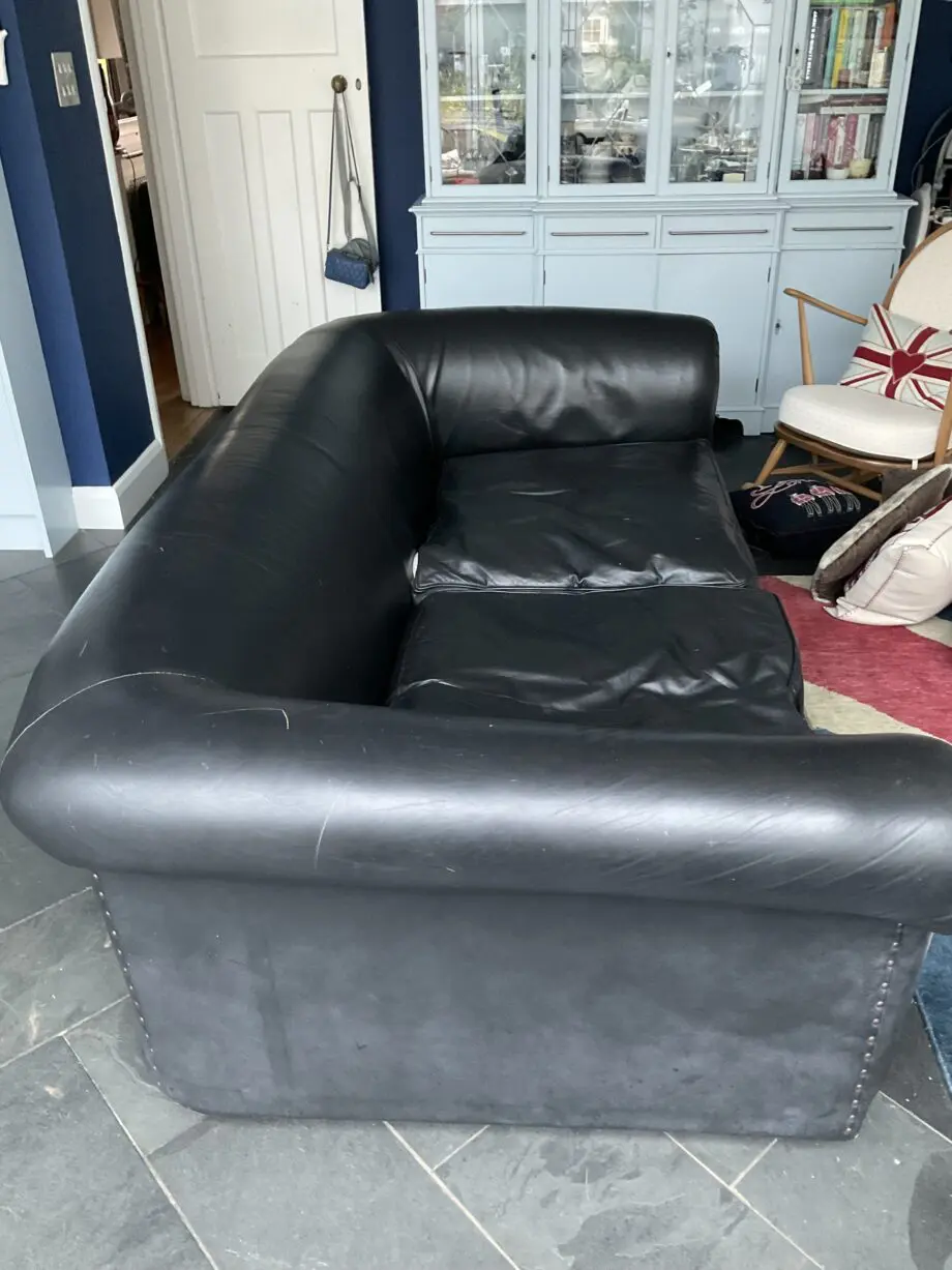 Black Leather HUGE sofa.
