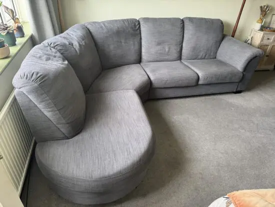 Large dark grey IKEA corner sofa