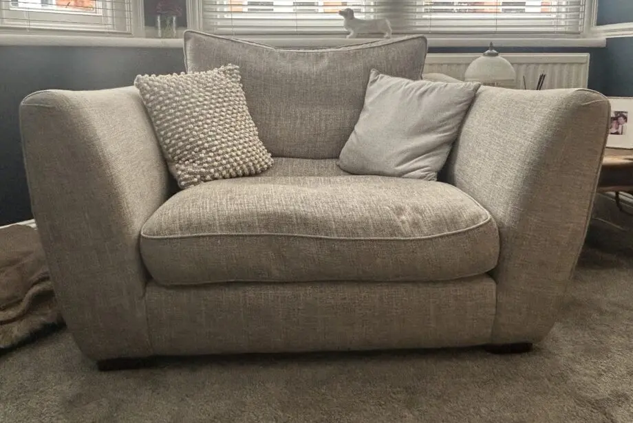Sofology Grey 4-seater sofa with matching loose side cushions, snuggle chair and footstool with storage